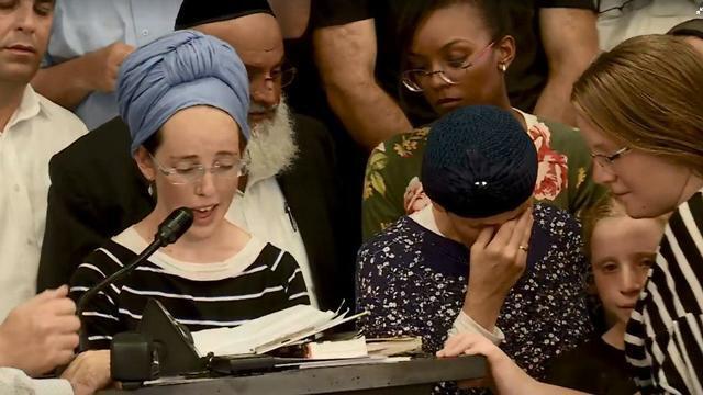 Tamar Levanoni eulogizes her sister, Rina, at her funeral in Lod