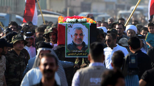 The funeral for the PMF commander killed in an Israeli alleged airstrike in Iraq (צילום: EPA) The funeral for the PMF commander killed in an Israeli alleged airstrike in Iraq