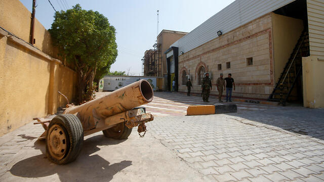 Members of the pro-Iran Popular Mobilization Forces in Basra (צילום: רויטרס) Members of the pro-Iran Popular Mobilization Forces in Basra