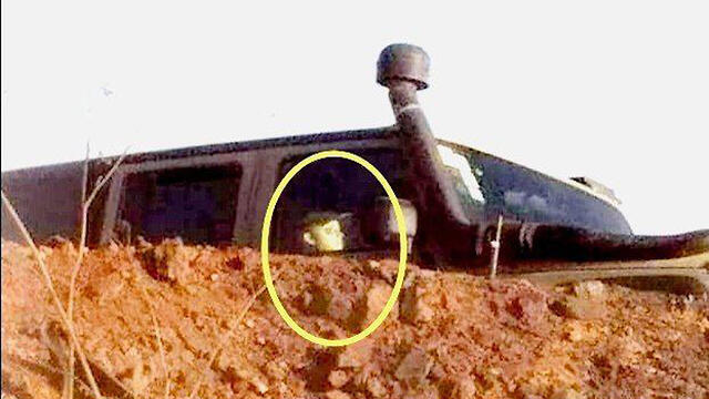 A dummy soldier in an IDF vehicle