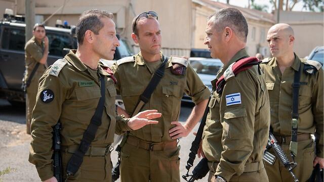  IDF Chief of Staff Aviv Kochavi, 2nd right, talks to senior officers in the north