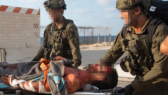 IDF troops stage injuries in the Hezbollah strike Sunday 