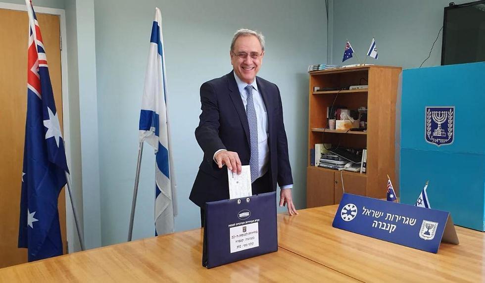 Israel's Ambassador to Australia Mark Sofer casts his vote in Canberra ahead of Tuesday's elections