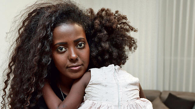 Sefy Bililin with her 3-year-old daughter