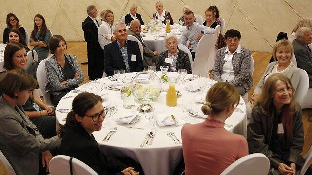 The participants and their families at the table