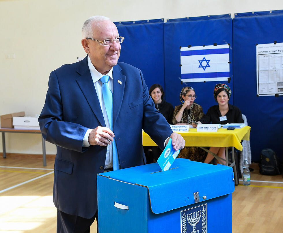 President Reuven Rivlin votes in Jerusalem in Tuesday's elections