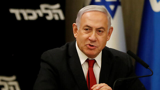 Benajmin Netanyahu speaking to reporters the day after the elections