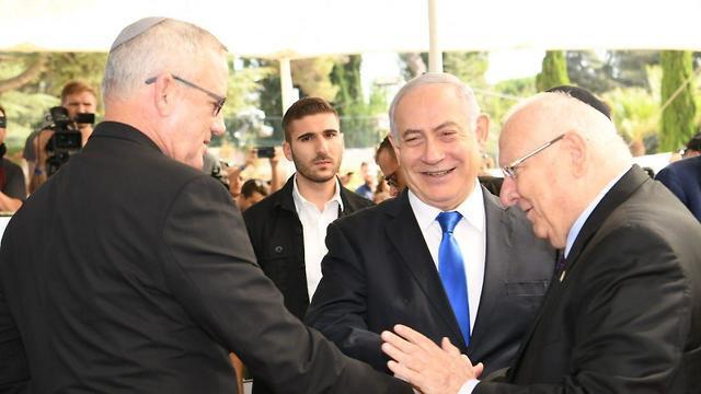 Benny Gantz, Benjamin Netanyahu and Reuven Rivlin at a memorial service for Shimon Peres in Jerusalem on Thursday on the third anniversary of his death