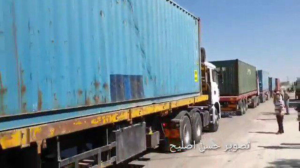 Trucks carrying equipment and medical supplies for a new filed hospital enter the Gaza Strip