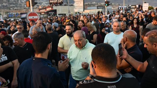 MK Ahmad Tibi at a demonstration against violence in the Arab community, in the town of Majd al-Krum on Thursday (חאג' אבו פאנה) MK Ahmad Tibi at a demonstration against violence in the Arab community, in the town of Majd al-Krum on Thursday