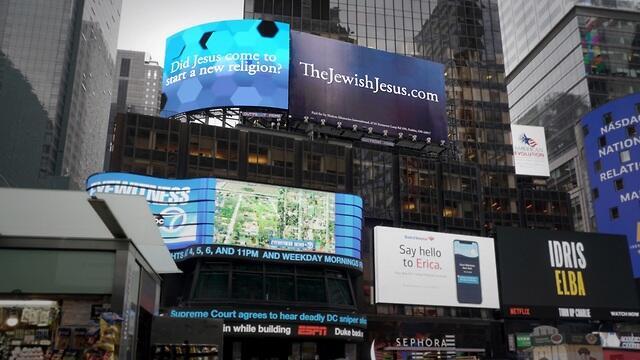 Kirt Schneider's billboards in Times Square, New York