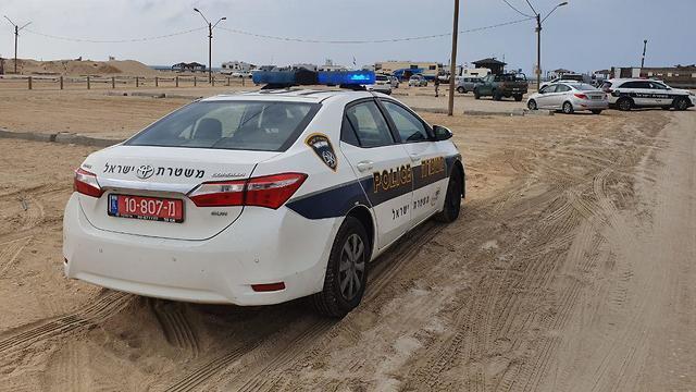 Police at the scene of the incident at Zikim Beach