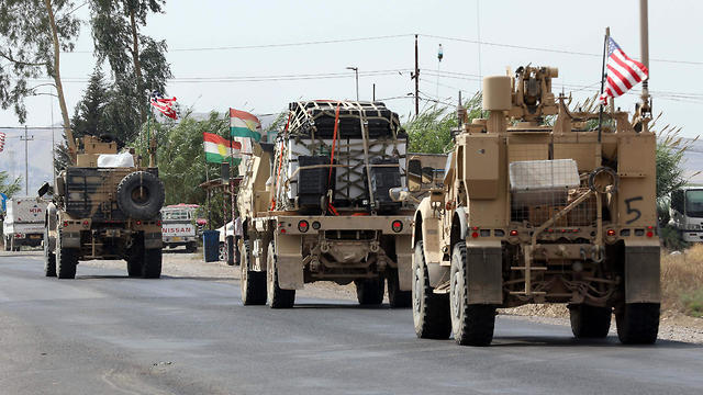 A convoy of U.S. military vehicles arrives near the Iraqi Kurdish town of Bardarash in the Dohuk governorate after withdrawing from northern Syria, Oct. 21, 2019 (Photo: AFP) A convoy of U.S. military vehicles arrives near the Iraqi Kurdish town of Bardarash in the Dohuk governorate after withdrawing from northern Syria, Oct. 21, 2019