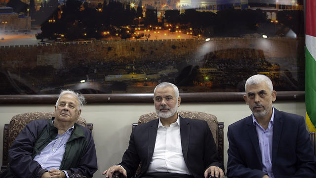 Head of Palestinian Election Comittee meets Ismail Haniyeh and Yahya Sinwar (Photo: AP) Head of Palestinian Election Comittee meets Ismail Haniyeh and Yahya Sinwar