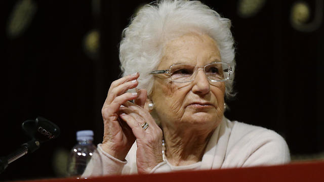 Holocaust survivor Liliana Segre speaks with young students on the occasion of an Holocaust remembrance, at the Arcimboldi theatre in Milan, Italy