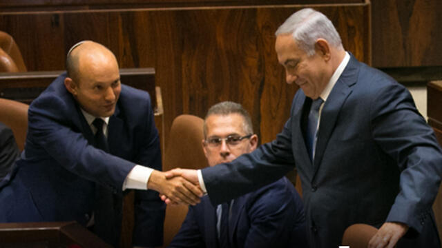 Naftali Bennett and Benhamin Netanyahu in the Knesset on Sunday