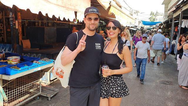 German tourist Roman and his companion in Carmel Market