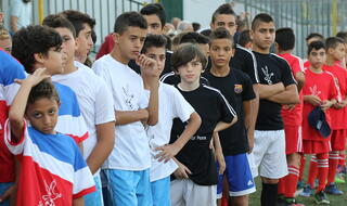 Israeli Jewish and Arab kids at soccer match