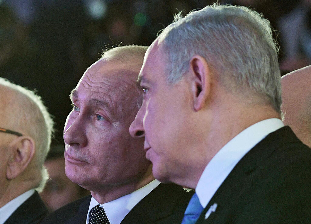 Russian President Vladimir Putin and Prime Minister Benjamin Netanyahu (Photo: Reuters) בנימין נתניהו עפ נשיא רוסיה ולדימיר פוטין טקס חניכה אנדרטה גן סאקר ירושלים