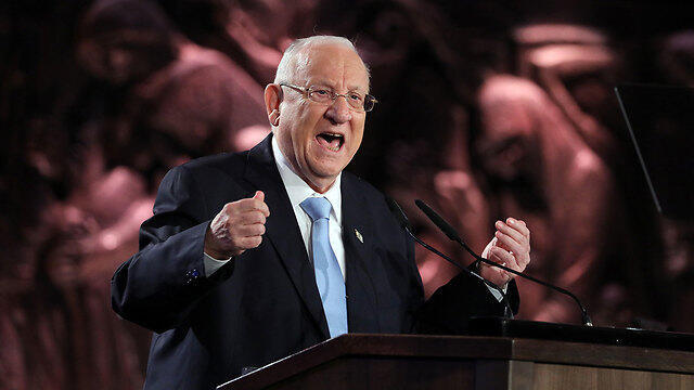 Президент Ривлин на форуме в "Яд ва-Шем". Фото: EPA