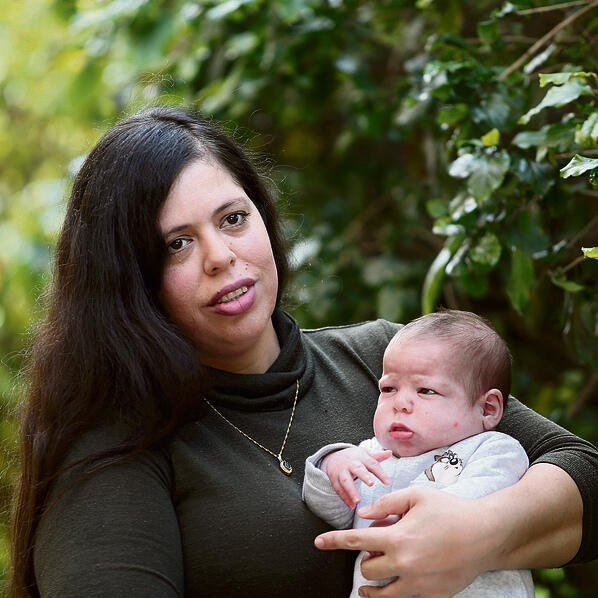 Мор Ясур с сыном. Фото: Ави Муалем