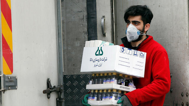 Коронавирус в Иране. Фото: EPA (צילום: EPA) Коронавирус в Иране. Фото: EPA