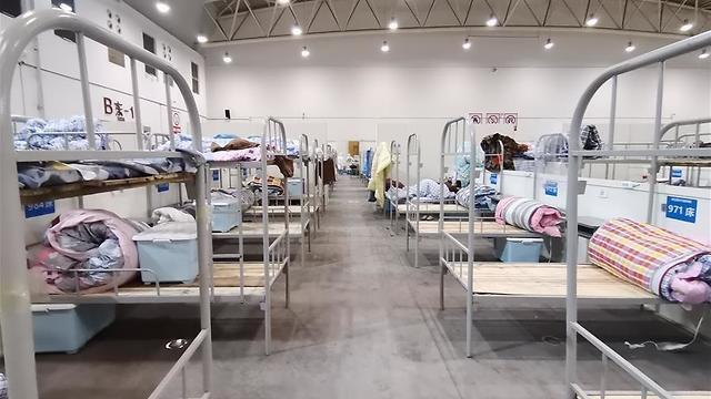 Больница для больных коронавирусом. Фото: Синхуа (צילום: סוכנות הידיעות הסינית שינחואה) Больница для больных коронавирусом. Фото: Синхуа