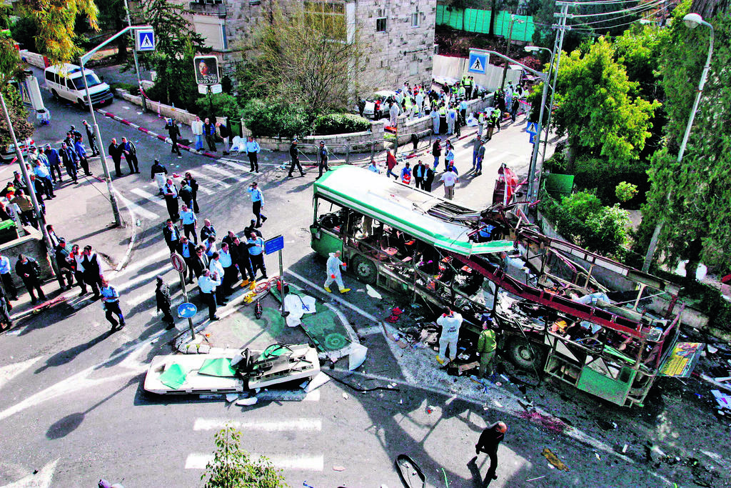 The remains of Egged bus No. 19 after a suicide bombing in Jerusalem’s Rehavia neighborhood on Jan. 29, 2004, that killed 11 people and wounded 44 (Photo: Dan Balilti) הפיגוע בקו 19 בירושלים