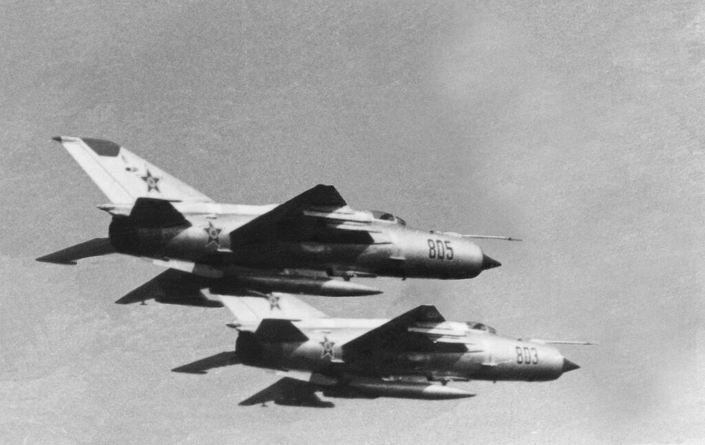 A pair of MiG-21s 