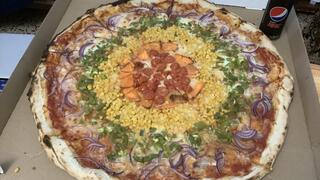 Pride Pizza, featuring vegetables in the colors of the rainbow flag, from PizzaPil in Tel Aviv 