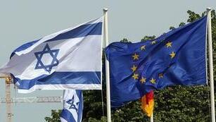 The flags of Israel and the EU fly together 