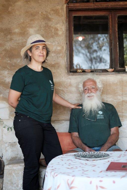 Ayala with her father Micha at the family olive press (Photo: Assi Haim) מיכה ואיילה נוי ריש לקיש