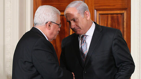 Palestinian President Mahmoud Abbas and Prime Minister Benjamin Netanyahu in 2013 