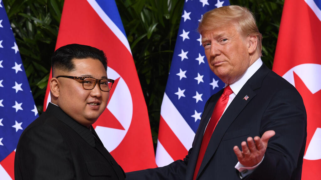 Trump and Kim at their first meeting in 2018 (Photo: AFP) 12 יוני 2018 מפגש הפסגה ההיסטורי בין דונלד טראמפ ל קים ג'ונג און ב סינגפור