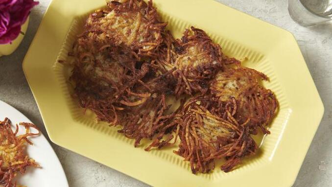 Plates of potato pancakes, or latkes 