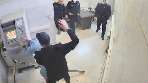 A frame grab taken from video shows a guard beating a prisoner at Evin prison in Tehran, Iran (Photo: AP) A frame grab taken from video shows a guard beating a prisoner at Evin prison in Tehran, Iran