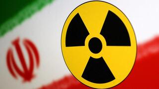 Nuclear symbol and Iran flag are seen in this illustration 