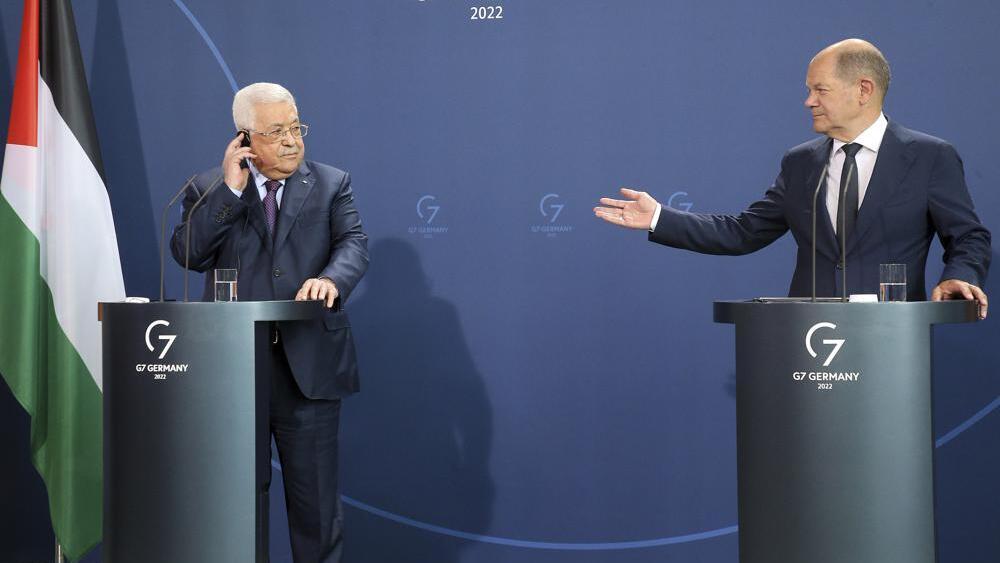 German Chancellor Olaf Scholz, right, and Mahmoud Abbas, President of the Palestinian Authority, answer questions from journalists at a press conference after their talks in Berlin, Germany (Photo: AP) German Chancellor Olaf Scholz, right, and Mahmoud Abbas, President of the Palestinian Authority, answer questions from journalists at a press conference after their talks in Berlin, Germany