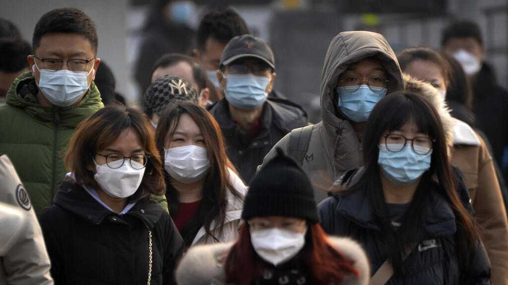 Photo: AP אנשים בבייג'ינג