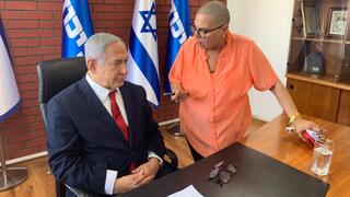 בנימין נתניהו וחני בליוויס