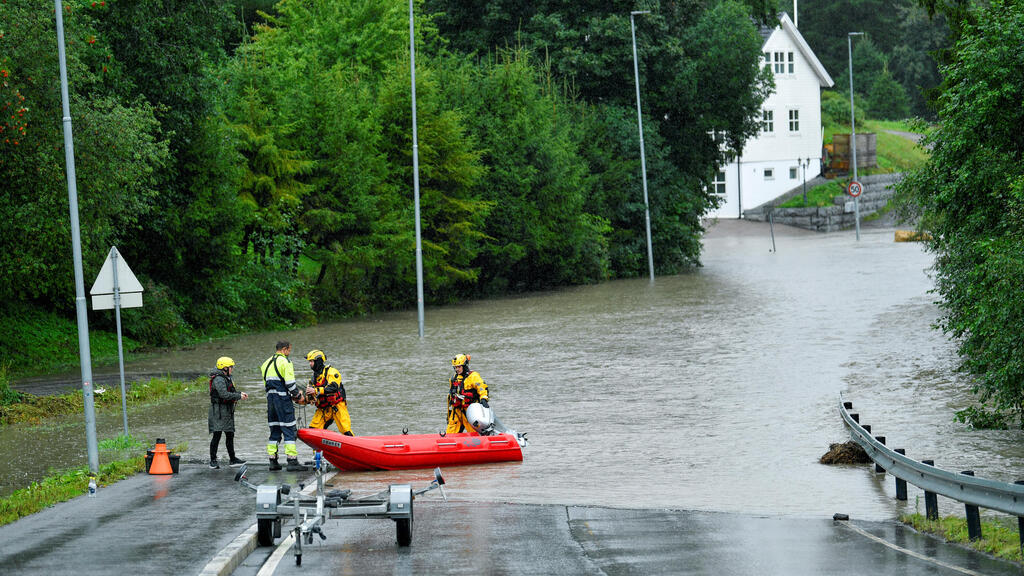 Photo: Reuters/NTB/Stian Lysberg Solum נורבגיה שיטפונות גשמים עזים ה סופה האנס אוסלו