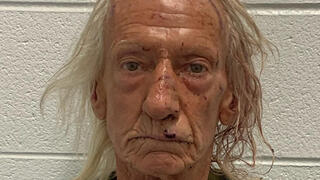 Joseph M. Czuba poses for a police booking photograph after being arrested by the Will County Sheriff's Office in Illinois