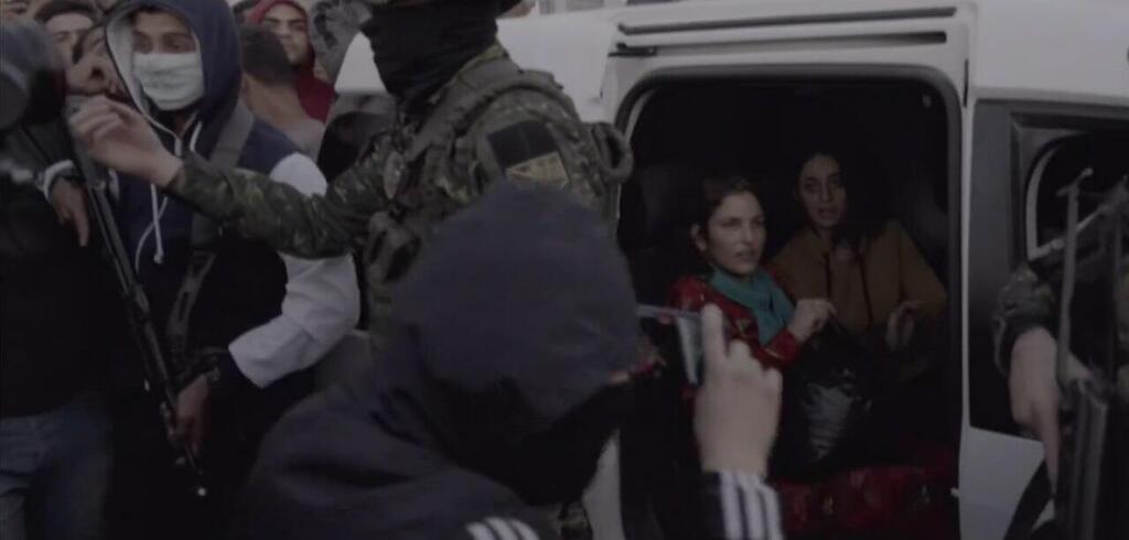 Soussana on the day she was released from captivity עמית סוסנה - חטופות עוברות לצלב האדום