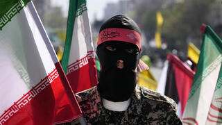 מתנדב בסיג' בעצרת יום ירושלים באיראן, החודש