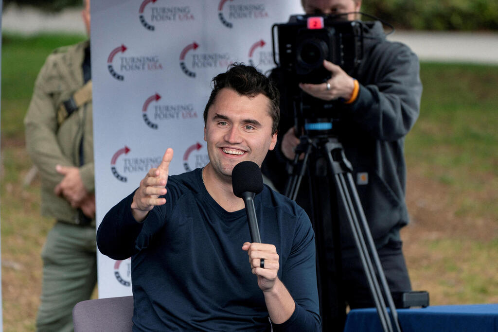 Charlie Kirk (Photo: REUTERS /David Ryder) מפגינים פרו פלסטיניים באוניברסיטת וושינגטון
