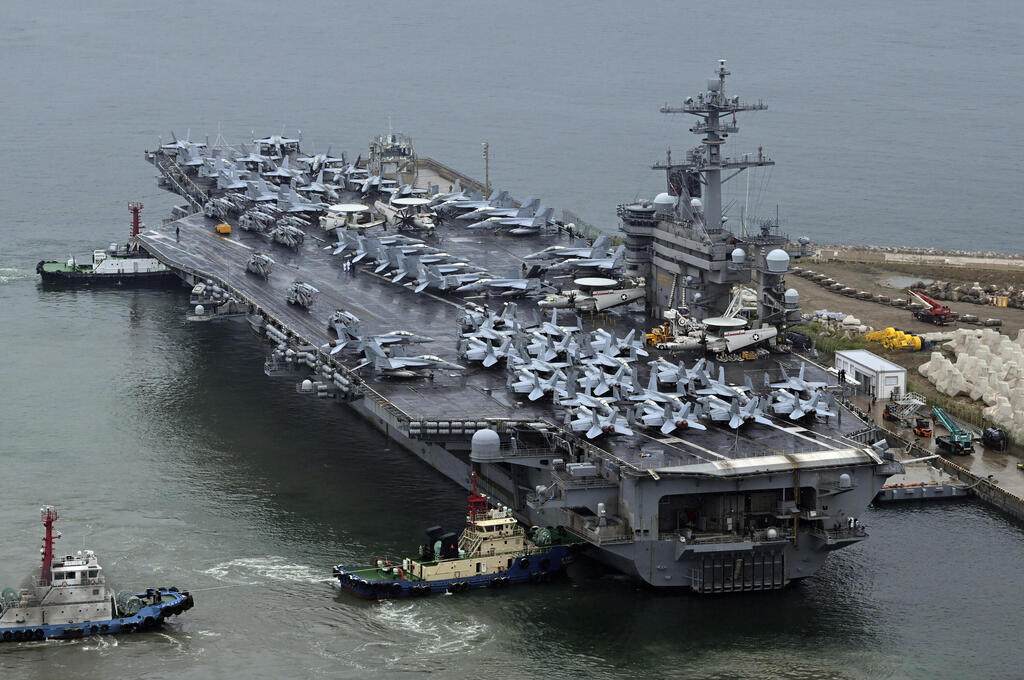 The USS Theodore Roosevelt heads to the Middle East. A military buildup not seen since the 2003 Iraq War (Photo: Kyung-Seok/Pool Photo via AP) נושאת המטוסים תאודור רוזוולט בדרום קוריאה