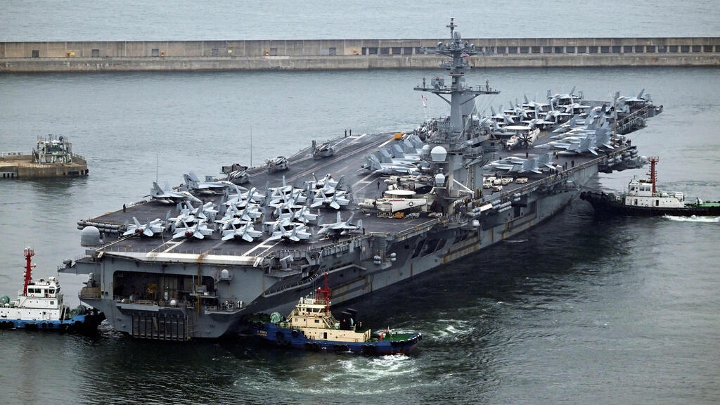 Aircraft carrier USS Theodore Roosevelt (Photo: Song Kyung-Seok / POOL / AFP) נושאת המטוסים תאודור רוזוולט בדרום קוריאה