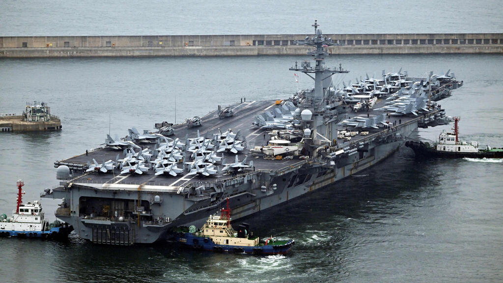 Aircraft carrier USS Theodore Roosevelt (Photo: Song Kyung-Seok / POOL / AFP) נושאת המטוסים תאודור רוזוולט בדרום קוריאה