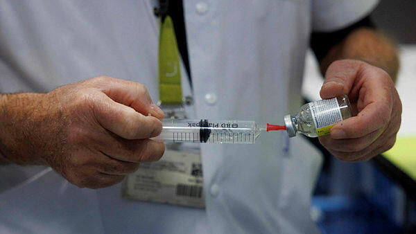 Any individual diagnosed by two physicians with a terminal illness may request a prescription for lethal medication. (צילום: Simon Wohlfahrt / AFP) המתת חסד בבלגיה