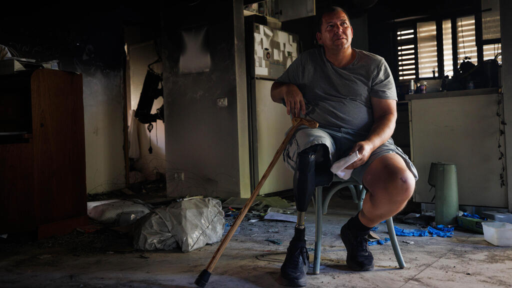 Avida Bachar, who managed the kibbutz’s agriculture branch, was seriously wounded and lost his leg (Photo: Ziv Koren) אבידע בכר